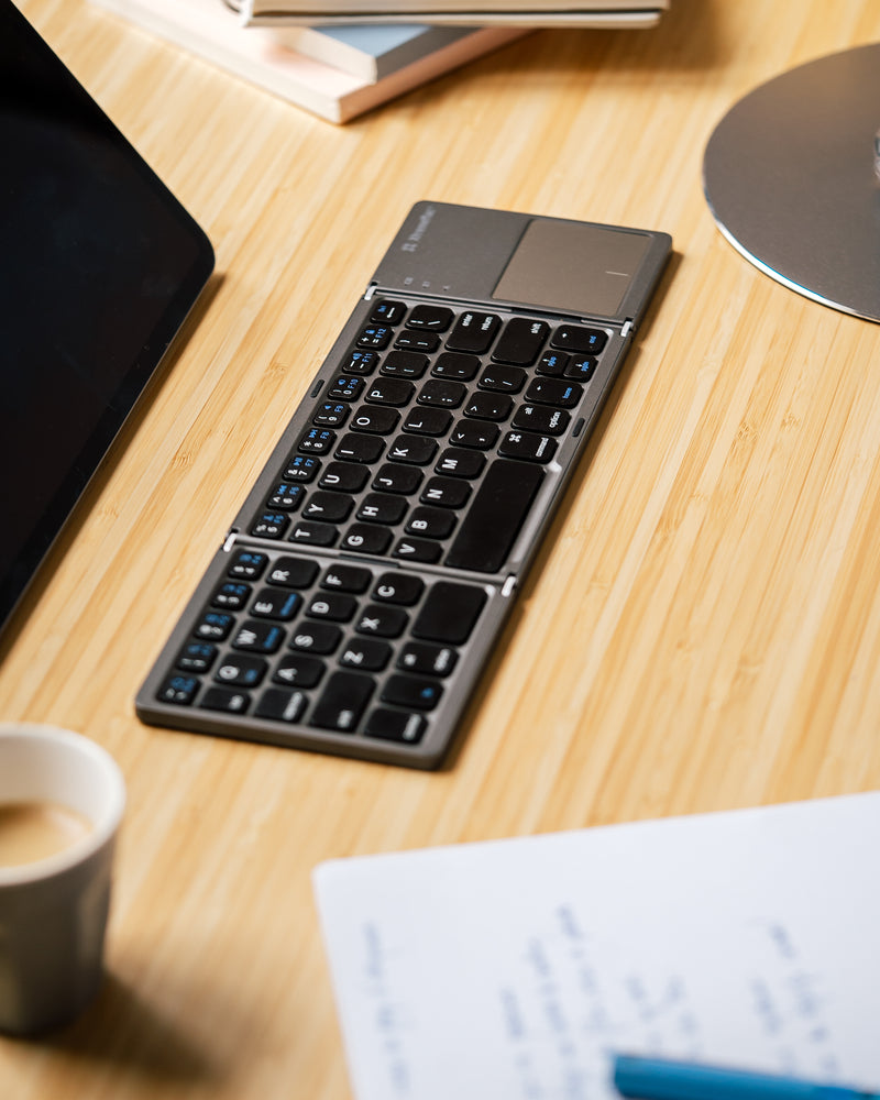 Tastiera da viaggio Bluetooth, pieghevole con touchpad